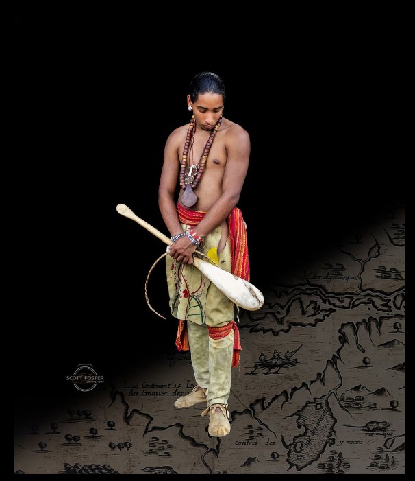 Native American man in traditional garb against a backdrop of antique topographical map