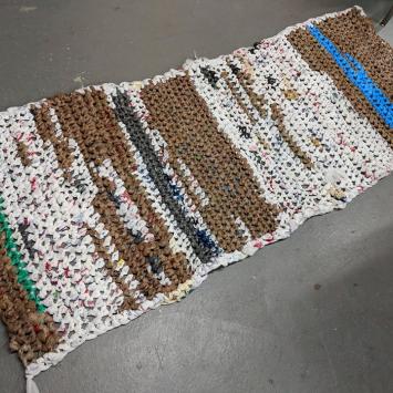 Floor mat made of single use plastic bags