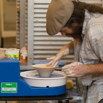 Mike Roche at Wheel in New Ceramics Studio Mike Roche at Wheel in New Ceramics Studio